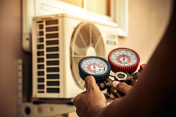 Professional Ductwork Repair technician working in Southbridge, MA